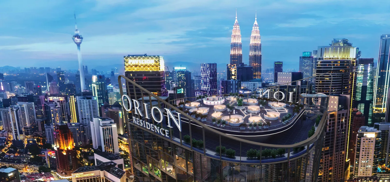 Orion Residence aerial night view of the tower above Bukit Bintang