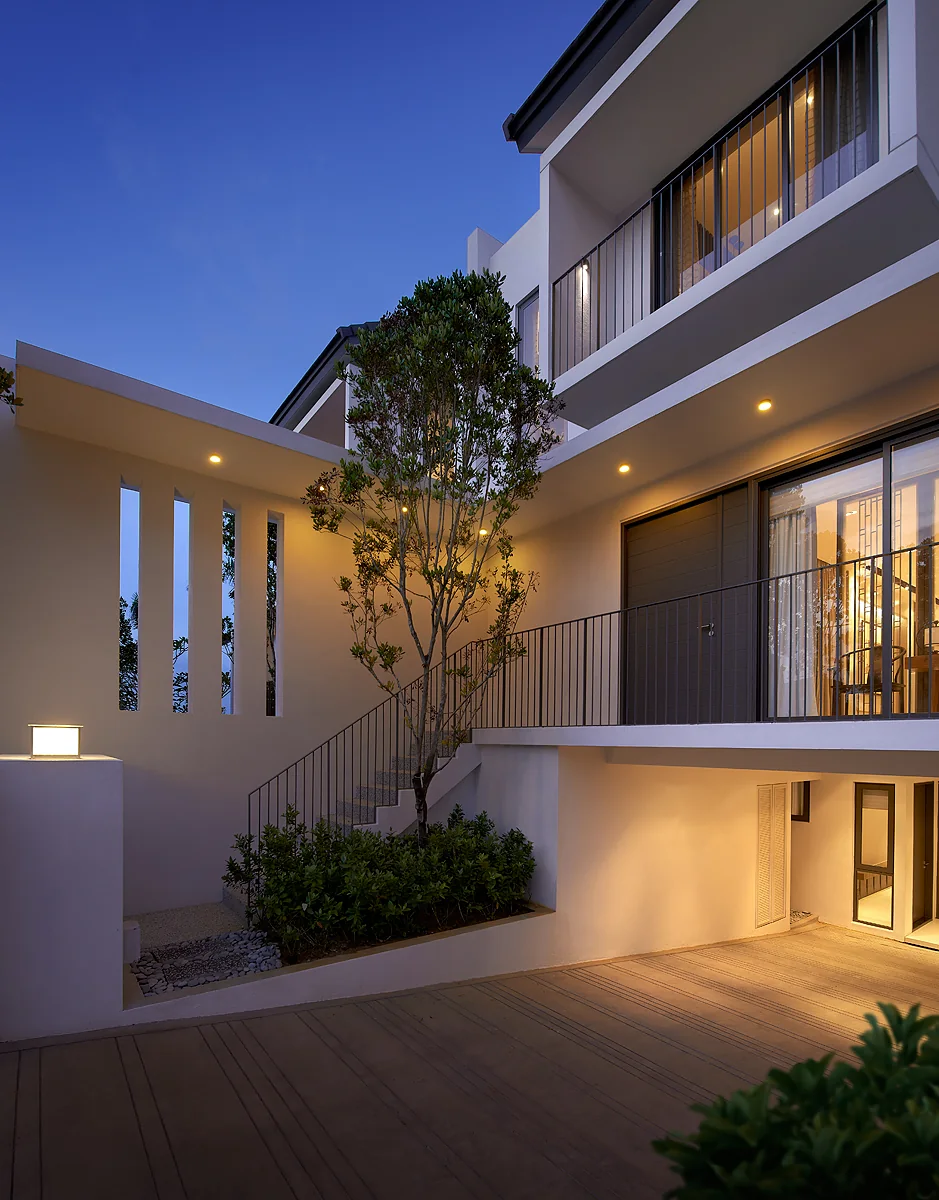 Vilaris Courtyard Homes front garden stair to living floor
